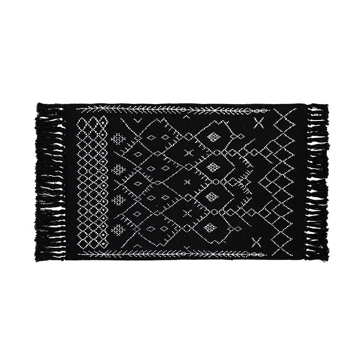 Woven cotton rug runner with flat weave structure, graphic diamond ethnic pattern and fringes