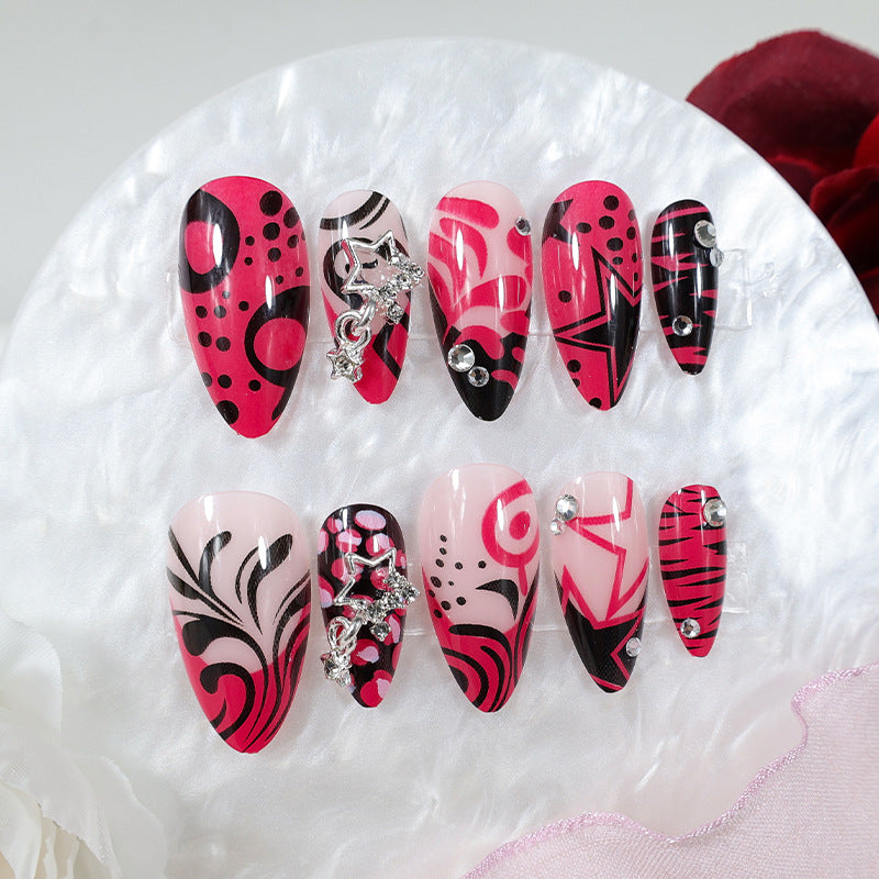 Nail art set with playful patterns and rhinestone embellishments Kalsten