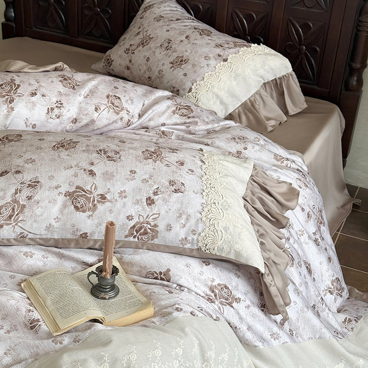 Elegant bedding set in vintage romantic style with lace applique, ruffle, and satin edging