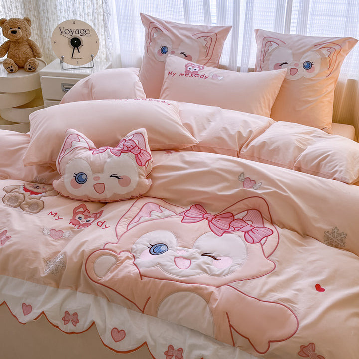 Playful children's bedding set with embroidered cat appliqué and cuddle pillow