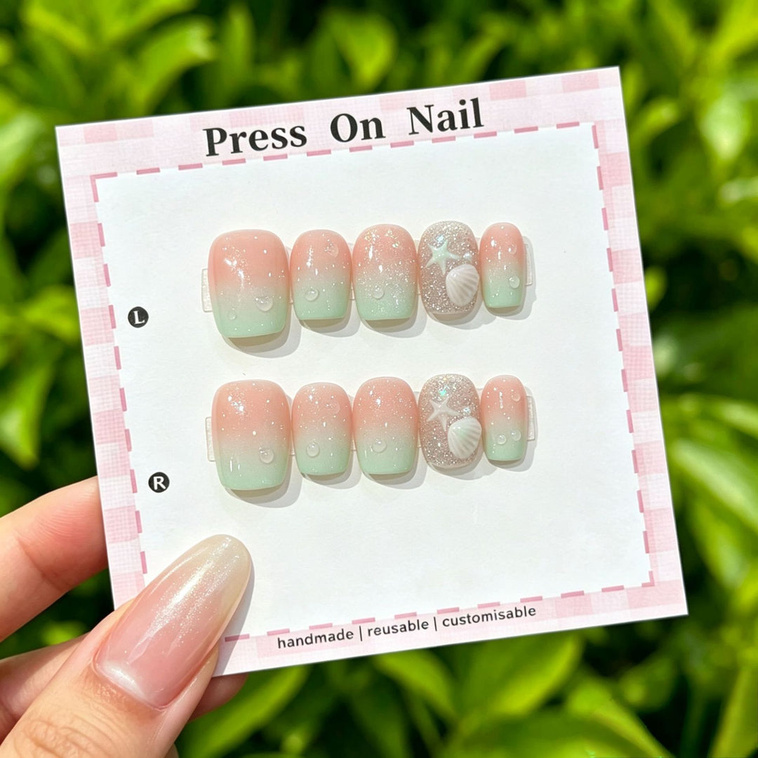 Artistic Press-On Nail Set with Shell and Star Accents