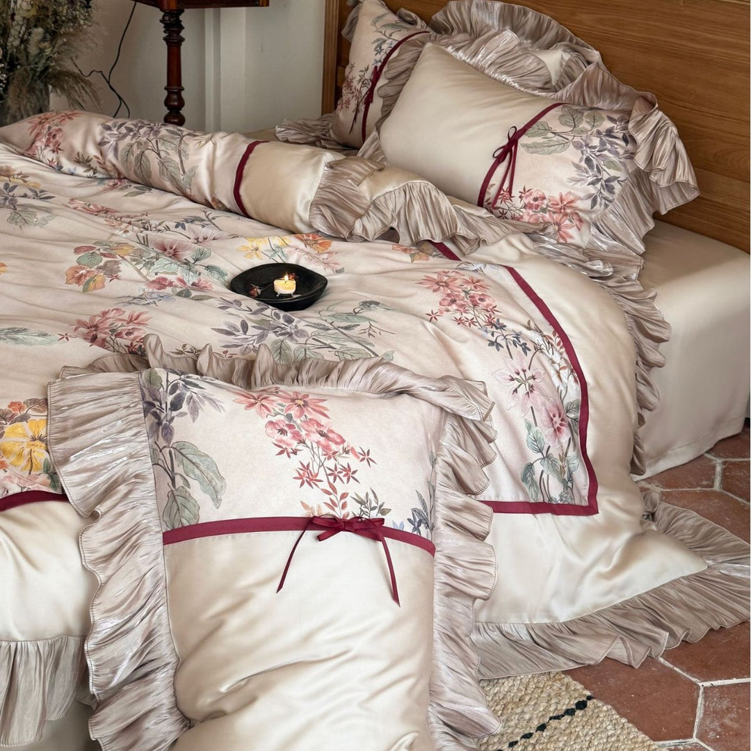 Romantic satin bedding set with ruffles, floral embroidery and reversible function