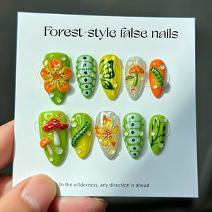 Artificial nails in forest style with floral and mushroom-shaped designs Kalsten