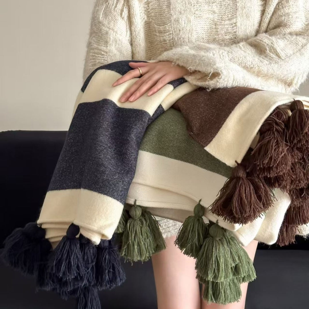 Soft woven blanket with tassels and diagonal stripes