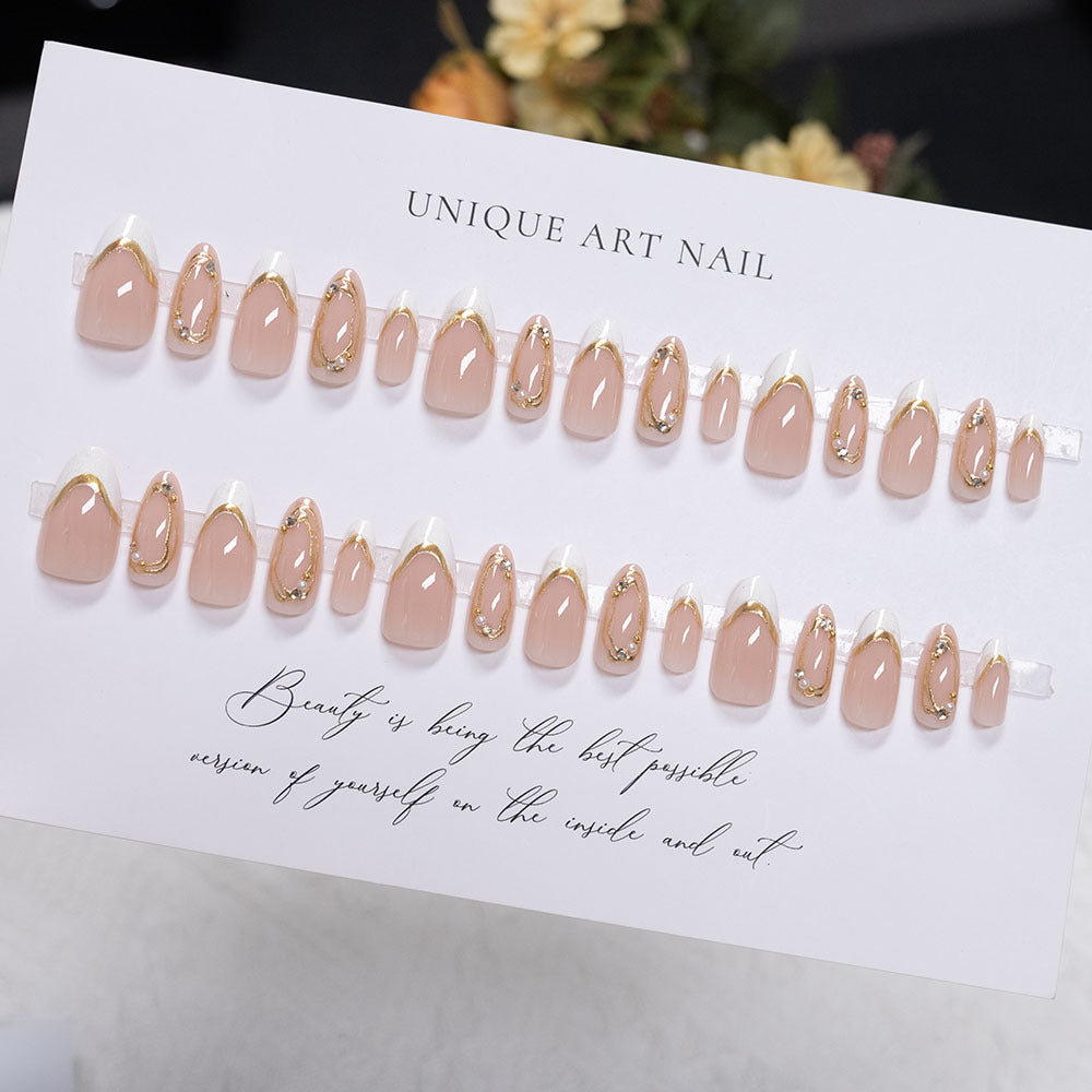Decorative Press-On Nail Art with Gold Accents