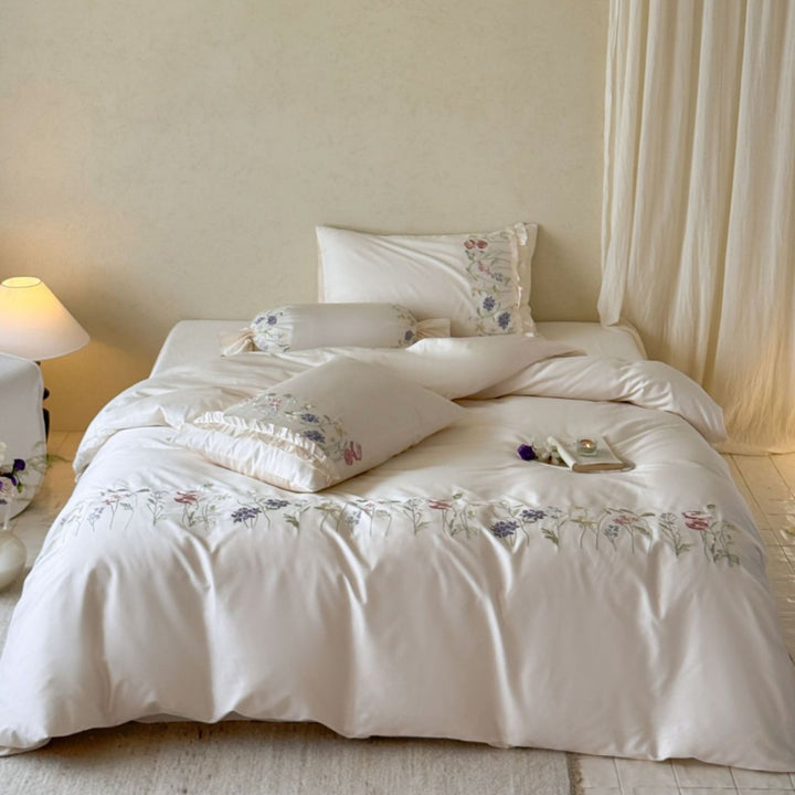 Embroidered duvet cover set with fine floral trim and soft satin feel