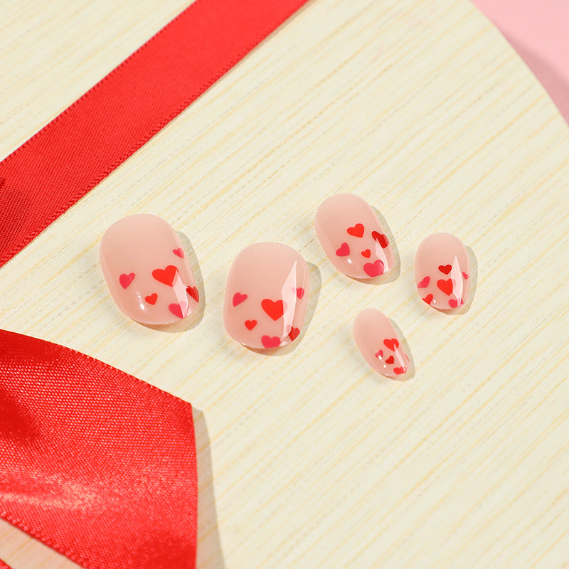 Artistic Nail Art with Heart Motif Kalsten