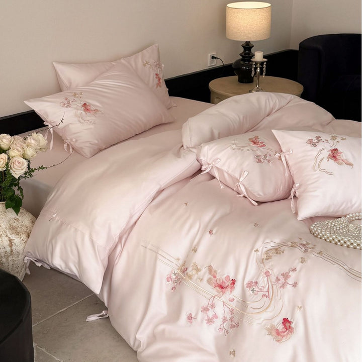 Embroidered satin bedding set with ribbon ties and delicate floral embroidery Kalsten