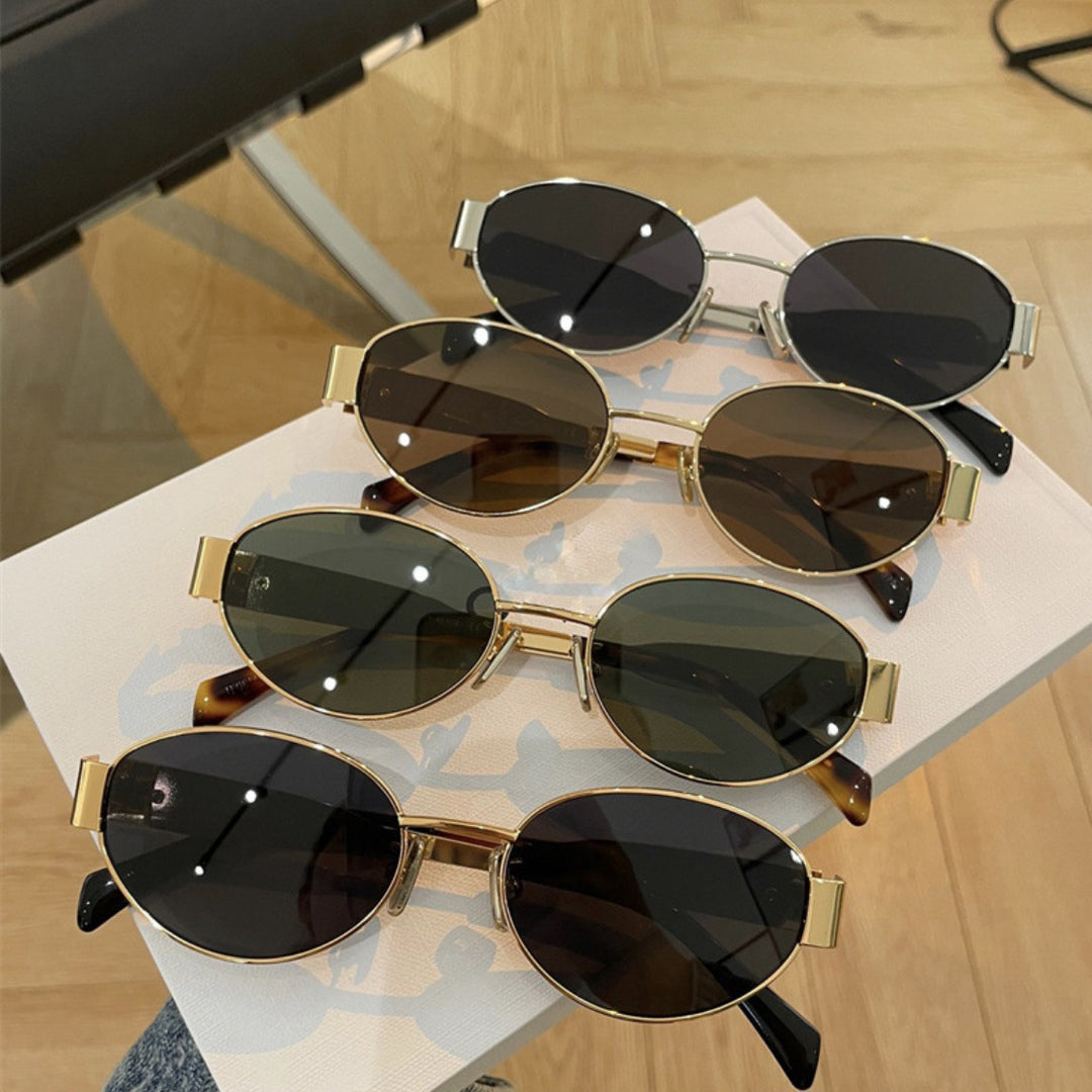 Women elegant oval sunglasses with gold-colored frame Kalsten