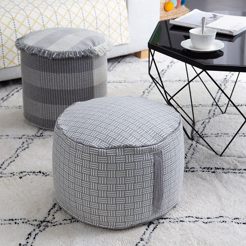 Padded pouf seat ottoman with woven structure and carrying handle