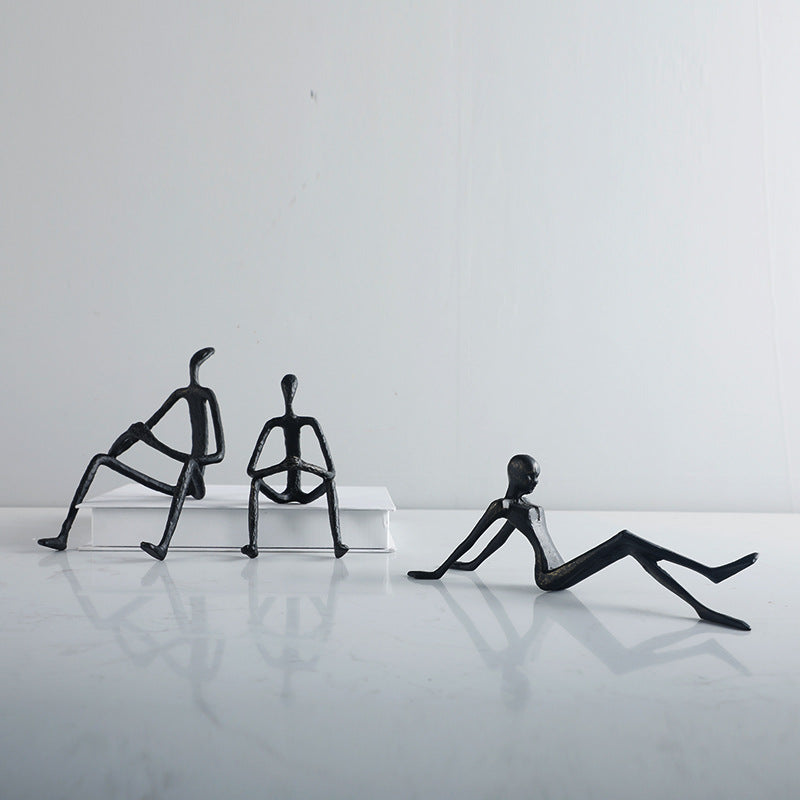 Artistic Sitting Figure Sculpture