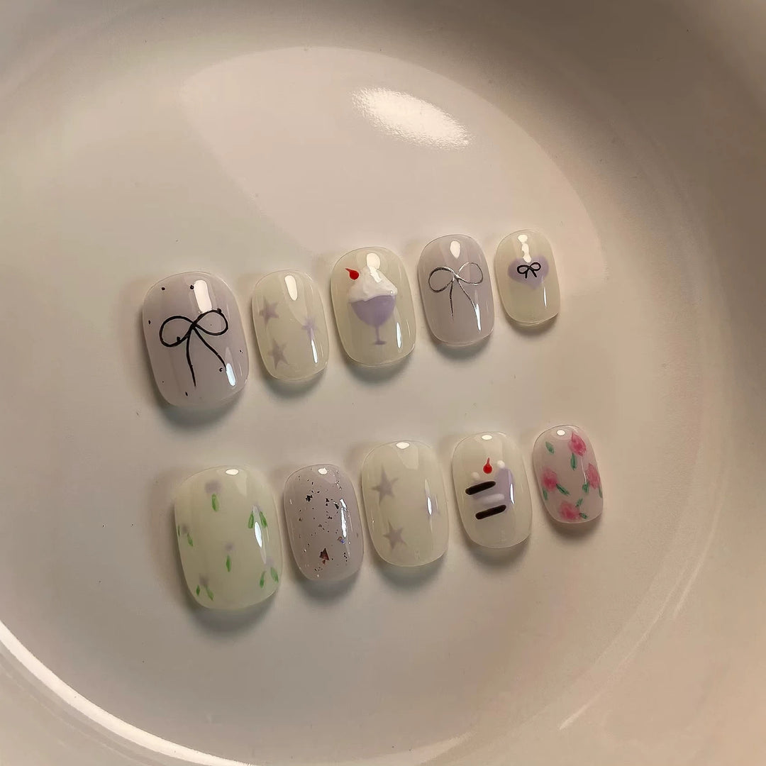 Artistic Press-On Nail Art Set with Cute Cake and Ribbon Designs