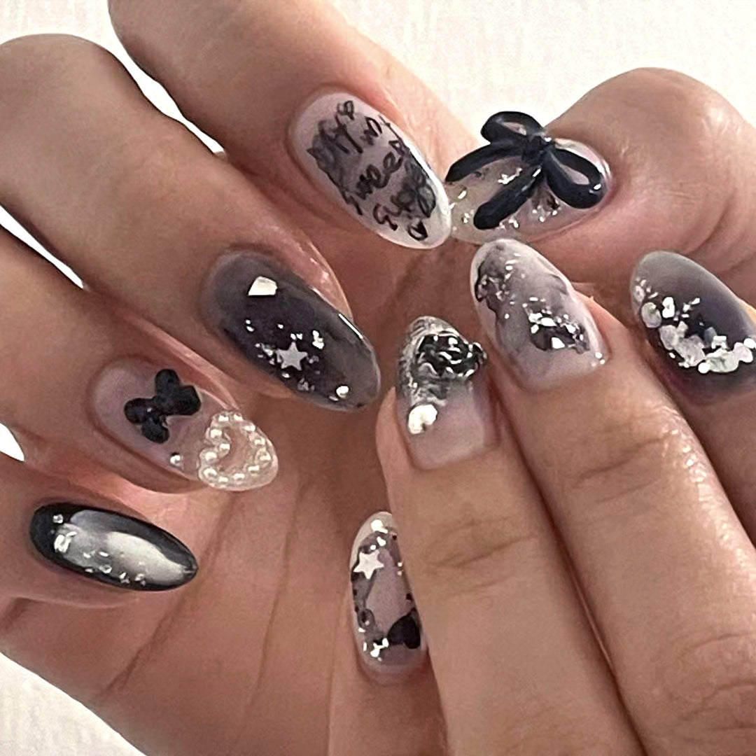 Artificial nail art with unique black and white design Kalsten
