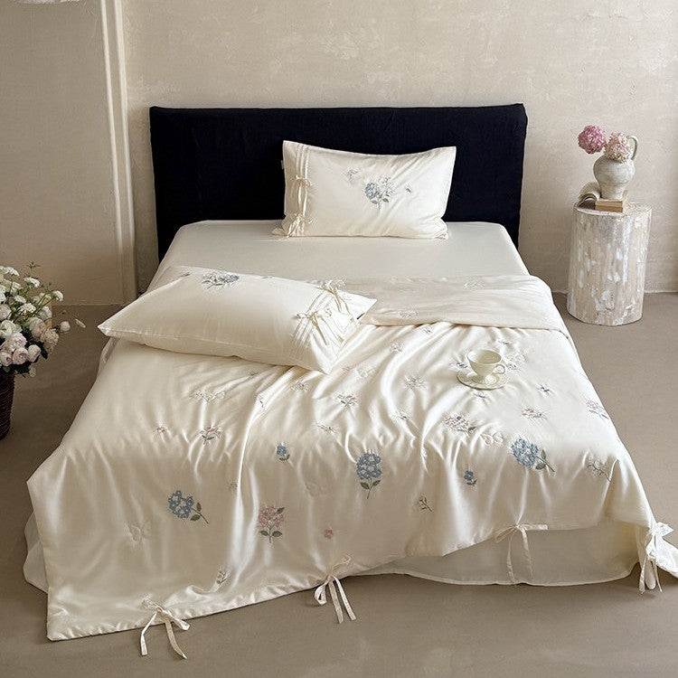 Embroidered satin bedspread set with ties and silky-glossy surface