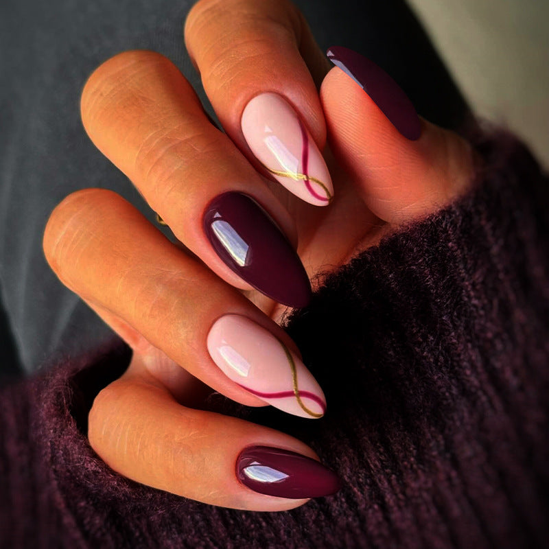 Artistic Almond-Shaped Press-On Nails with Elegant Gold Detailing Kalsten
