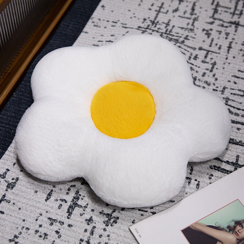 Padded seat cushion in flower shape with faux leather center piece and fluffy edge padding