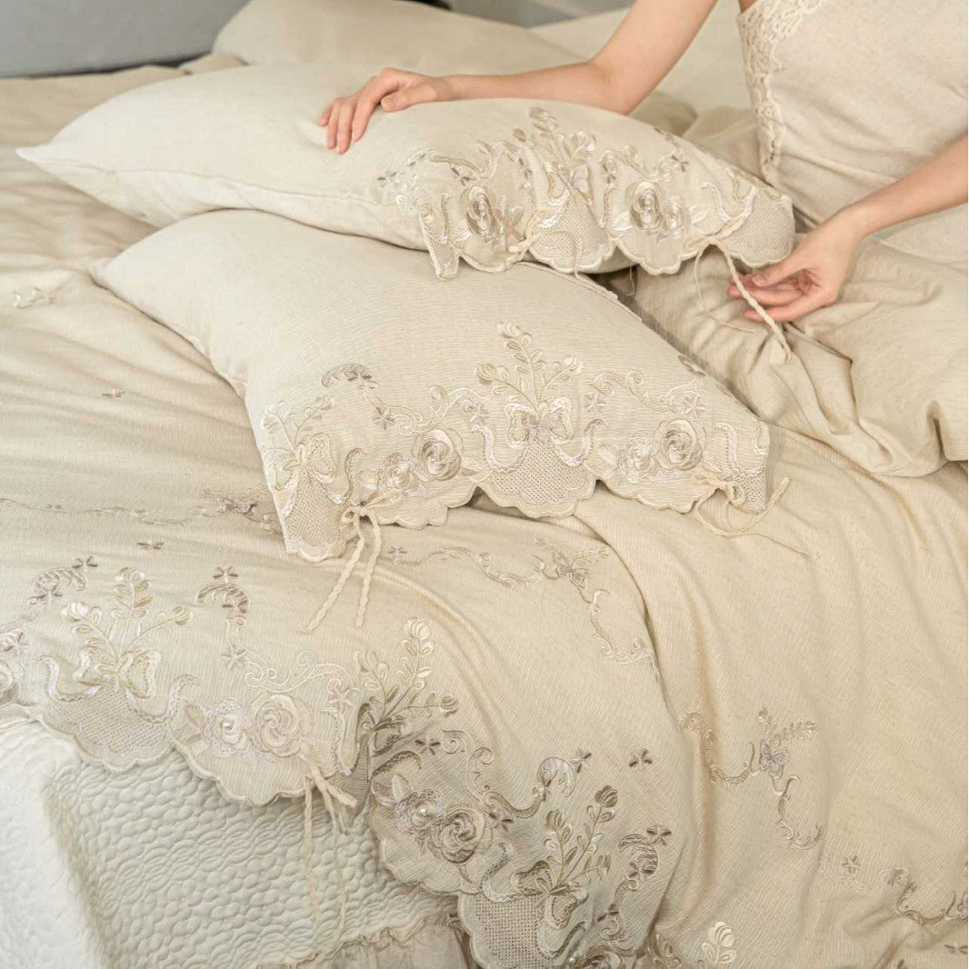 Luxurious embroidered linen bedding set with lace edge