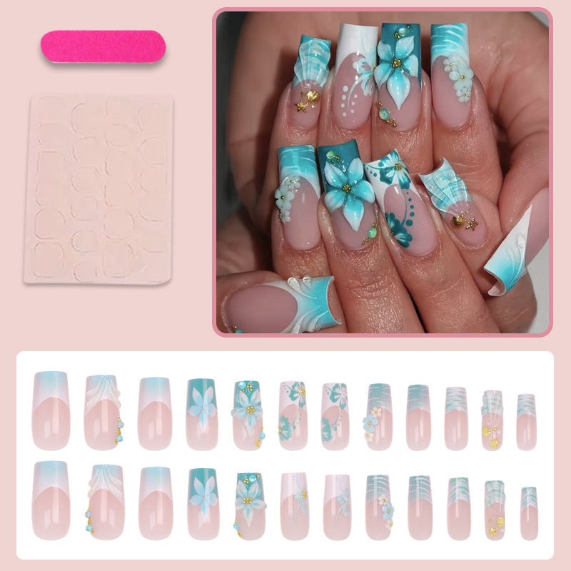 Acrylic nail set with elegant floral decorations and glitter accents Kalsten