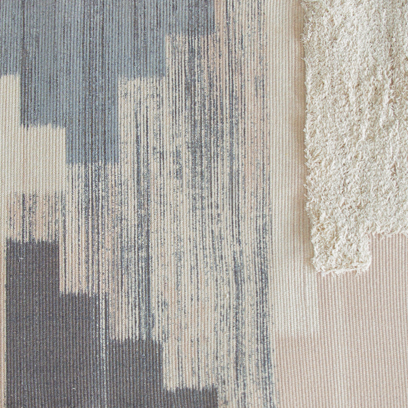 Modern woven living room rug with abstract structure and tufted high-pile accents Kalsten
