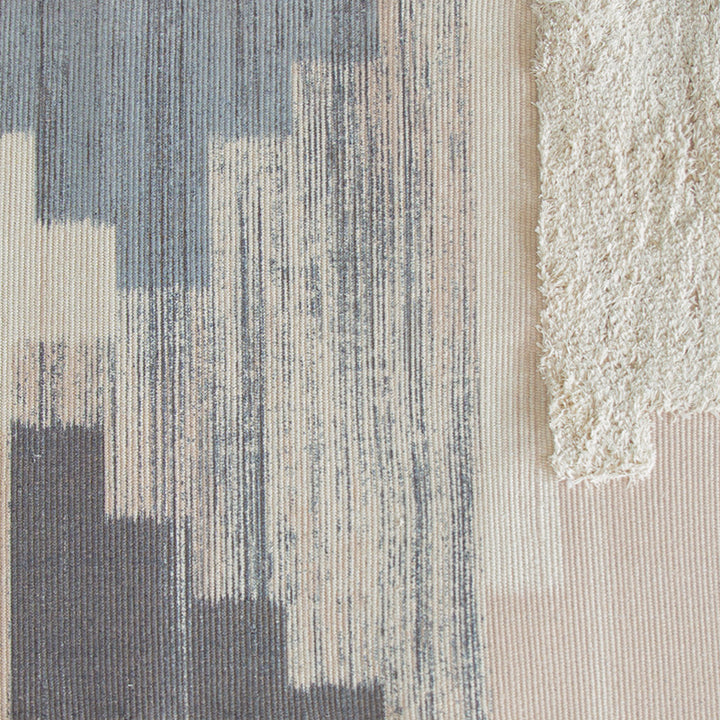 Modern woven living room rug with abstract structure and tufted high-pile accents Kalsten