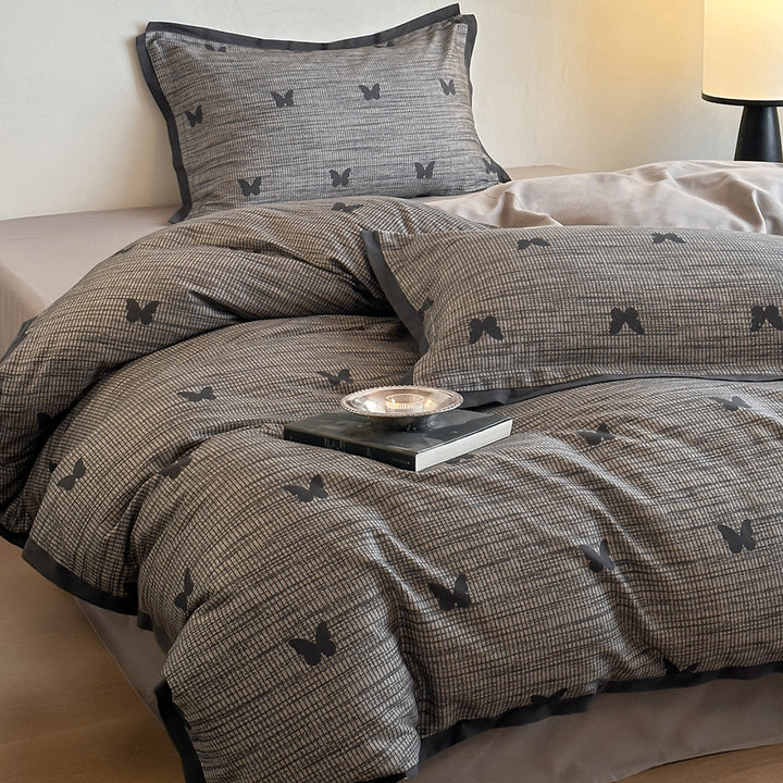 Duvet cover set with fine check pattern and subtle floral relief made of cotton blend