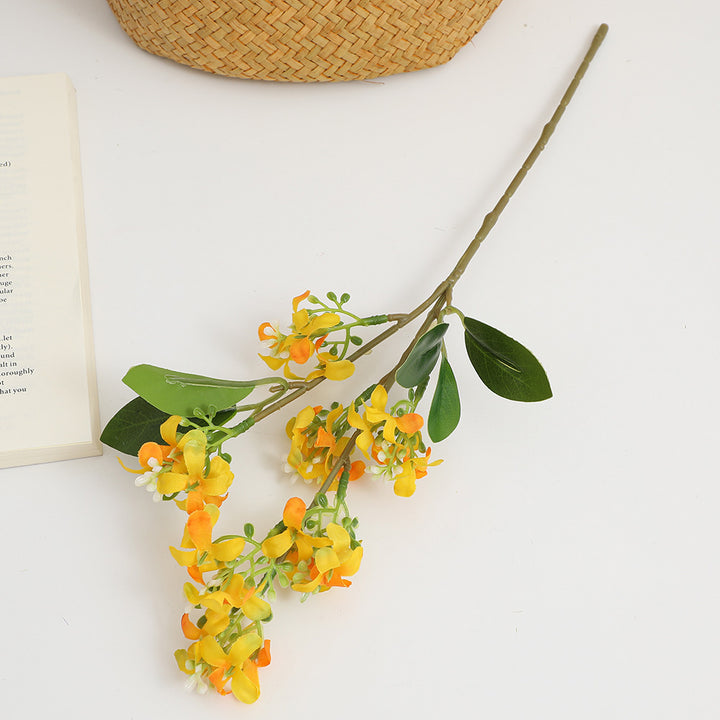 Artificial flower branch with bright flowers