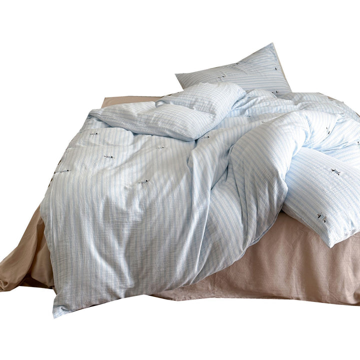 Cotton duvet cover set with fine pinstripes and subtle embroidery applications