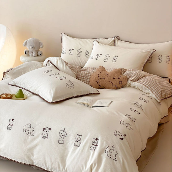 Bedding set made of cotton percale with fine embroidery and cute dog motifs