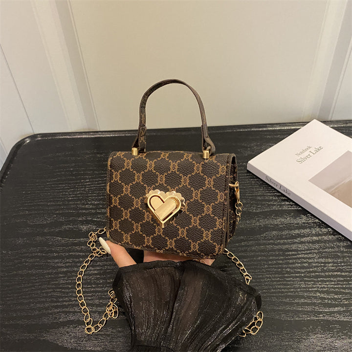 Elegant Heart-Embellished Handbag