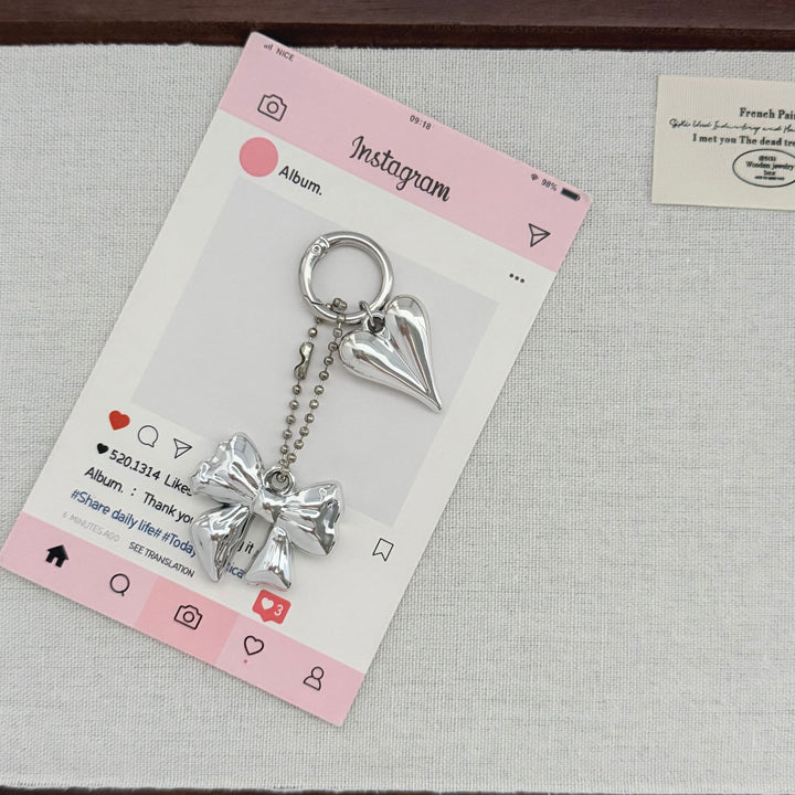 Heart-Shaped Charm Keychain with Bow Kalsten