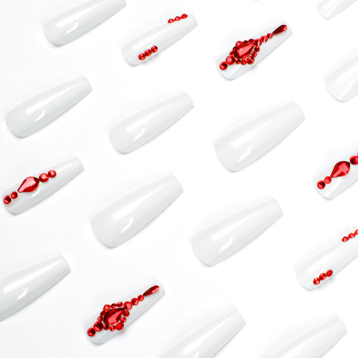 Artful nail extensions with glitter accents and elegant embellishments Kalsten