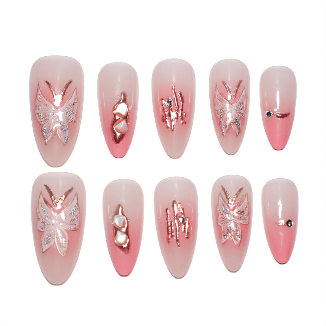 Artificial nail extensions with floral motifs and glitter accents Kalsten