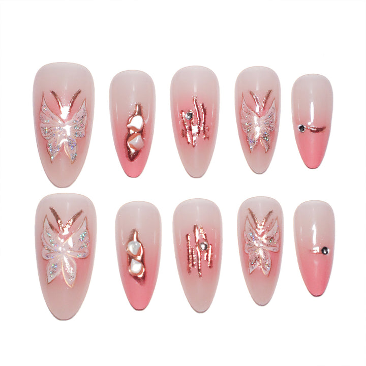Artificial nail extensions with floral motifs and glitter accents Kalsten