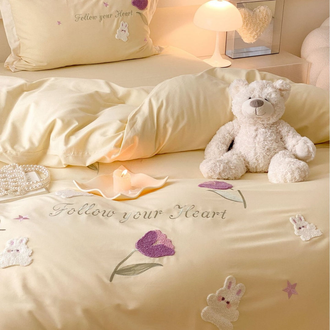 Romantic cotton satin bedding set with embroidered rabbit and flower appliqués