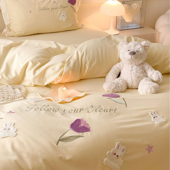 Romantic cotton satin bedding set with embroidered rabbit and flower appliqués