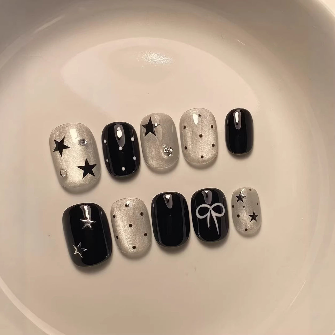 Artistic Press-On Nail Set with Star and Bow Accents