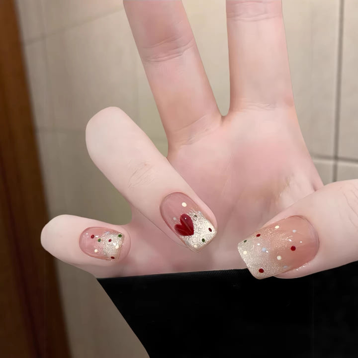 Artistic Press-On Nail Art Set with Floral and Glitter Accents