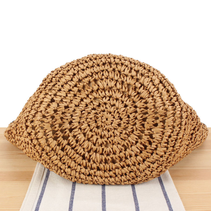 Beach shoulder bag made of handwoven natural material with comfortable carrying handles Kalsten