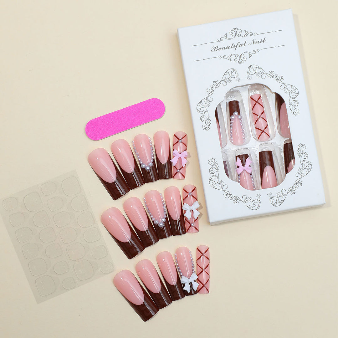 Creative nail art set with stylish bow and glitter accents Kalsten