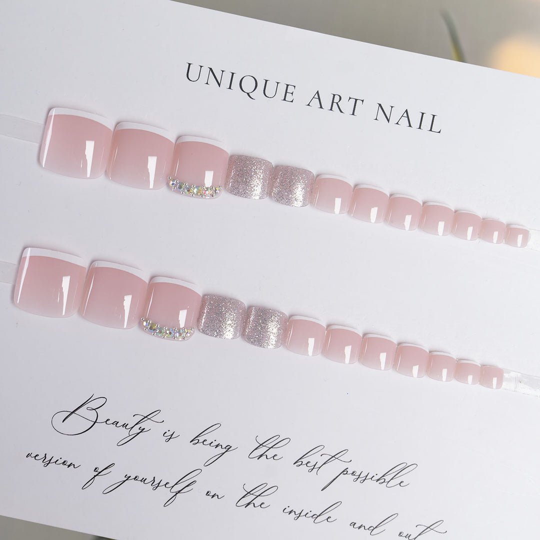 Elegant Rhinestone-Embellished Toenail Art