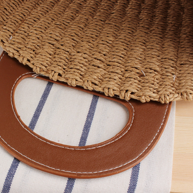 Tote bag made of braided natural material with elegant leather back Kalsten