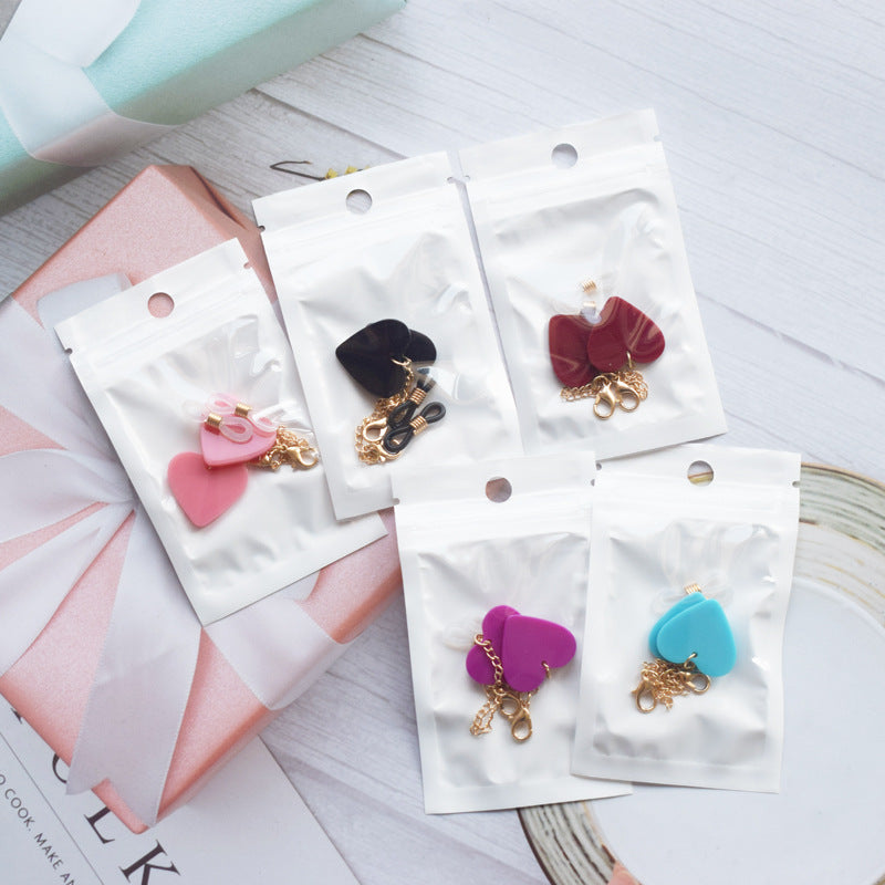 Heart-Shaped Dangle Earrings with Gold Chain Kalsten