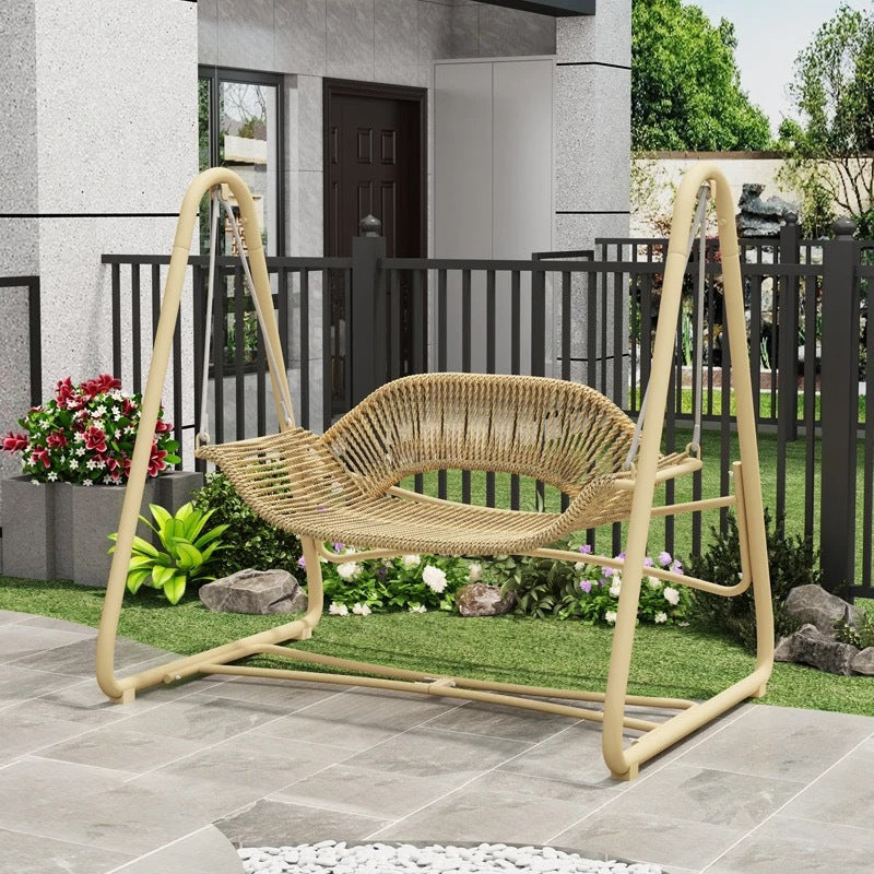 Woven rattan outdoor swing loveseat with padded cushions and powder-coated steel frame Kalsten
