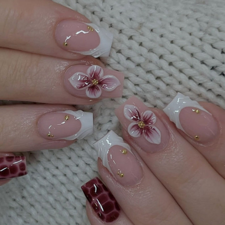 Artificial nail set with luxurious 3D flower accents and glitter details Kalsten