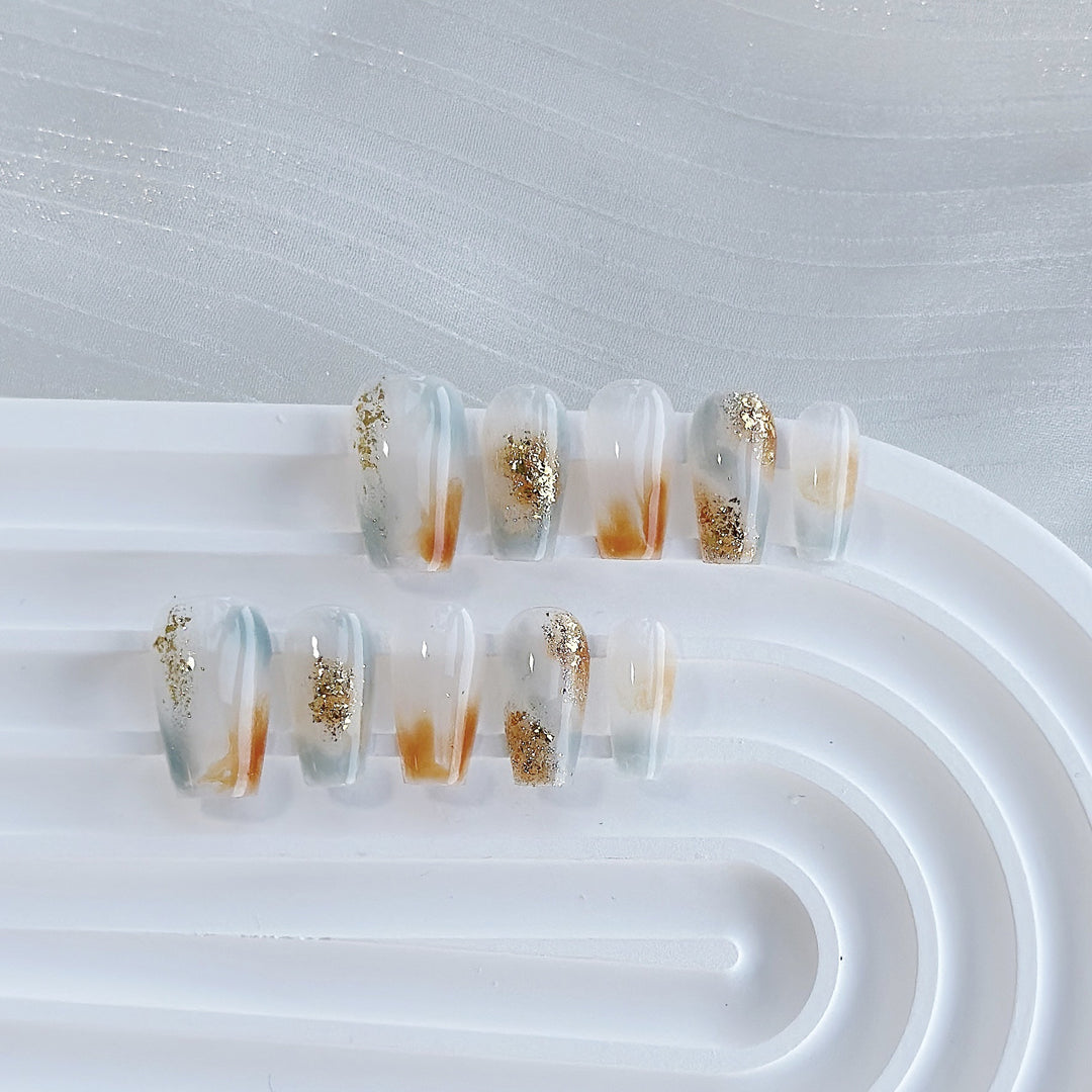Artistic Press-On Nail Art Set with Heart and Celestial Designs