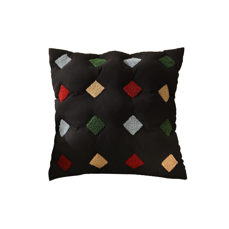 Filled decorative cushion with colorful tuft diamonds and padded structure