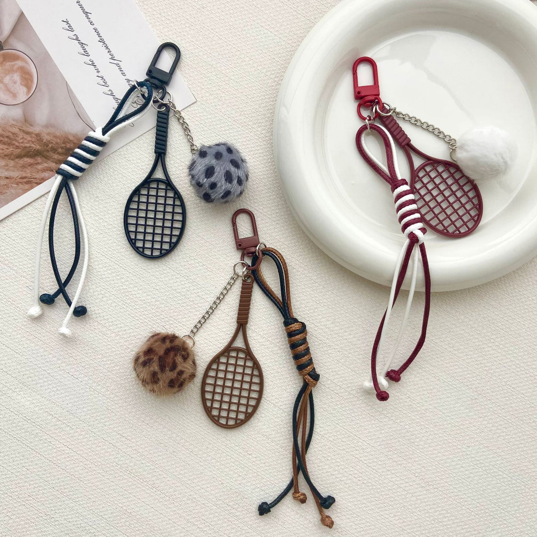 Tennis Racket and Fur Ball Keychain Kalsten