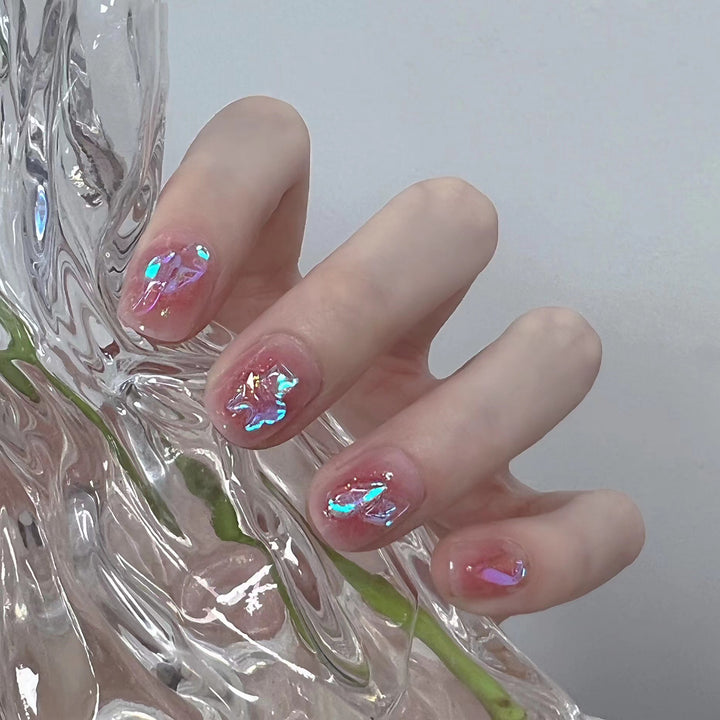 Shiny nail art with holographic accents Kalsten