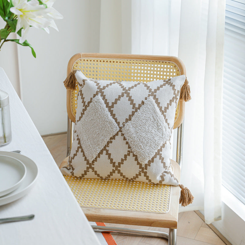 Decorative Boho cushion cover with hand-tufted diamond relief, tassels, and woven cotton blend Kalsten