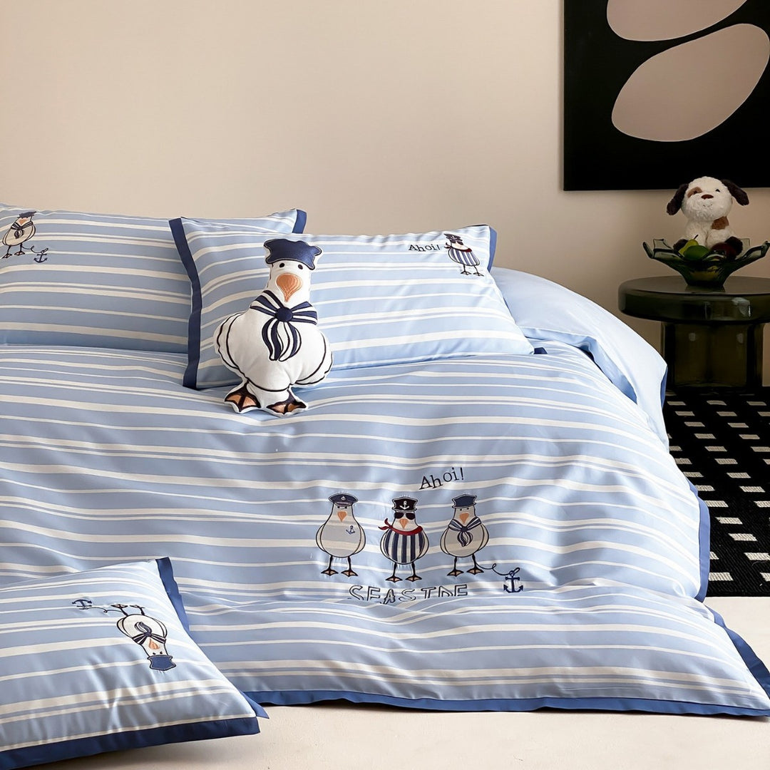 Maritime cotton satin bedding set with embroidered seagull motifs and fine stripe pattern